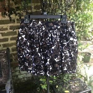 XXi- BROWN/BLACK FLORAL PRINT MINI SKIRT- Size Large- NWOT